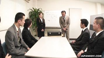 So she introduces him to pussy licking by sitting on top of his face on the desk in the classroom.