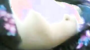 Horny guy fingers Malaysian GF's hairy pussy inside the car.