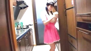 Asian housewife gets naughty in the kitchen. 3
