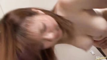 She is getting her tits licked and fondled while showing off her nice ass.
