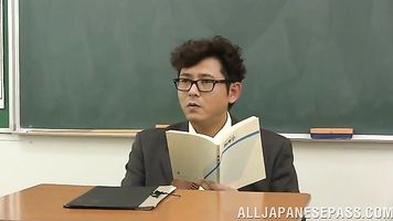 Horny Japanese teacher with naughty thoughts on her mind, Kanako Iioka, starts sucking these lads cocks in a very naughty way, enjoying steamy gang bang porn right in the classroom.