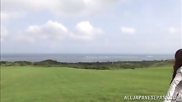 Sex appeal milf Yui Hatano makes a solo play outdoors.