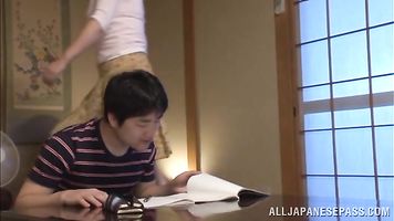 Cock-starved mature Chiaki Takeshita licks dick in 69.