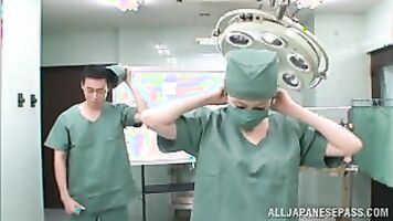 Glamorous Asian nurse moans as she is nailed.
