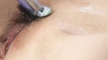 Little teen babe Misaki gets her pussy shaved by a stranger.