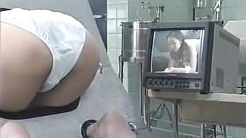 Japanese AV Model is a milf in the ass stockade getting an enema - Weird Japan.