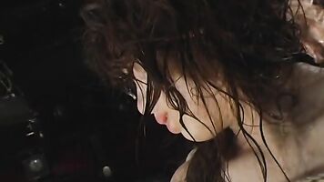 Then the scene starts out by having the poor brunette completely naked and on the floor while she gets splashed with a ton of water.